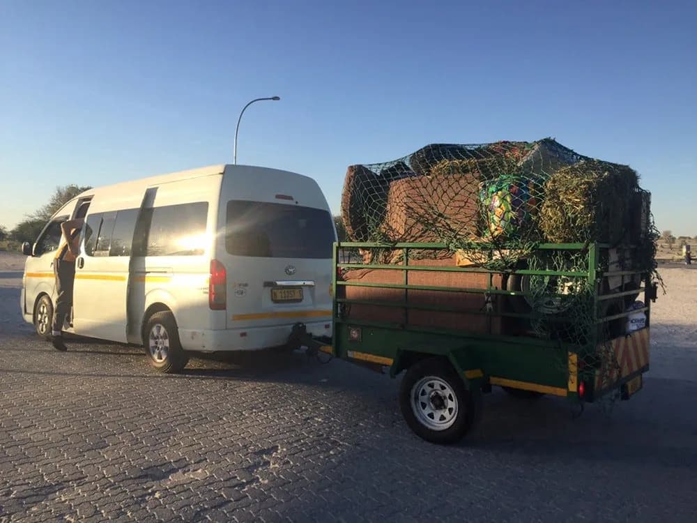 OCI van towing a trailer for goods transport
